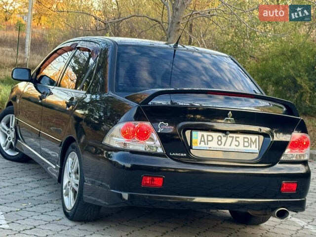 Міцубісі Lancer 2006 у Дніпро (Дніпропетровську) на Automoto.ua Чорний Міцубісі Lancer, об'ємом двигуна 2 л та пробігом 230 тис. км за 4900 $, фото 8 на Automoto.ua