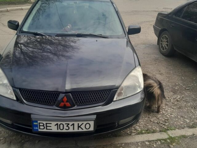 Черный Мицубиси Лансер, объемом двигателя 1.6 л и пробегом 260 тыс. км за 3800 $, фото 9 на Automoto.ua