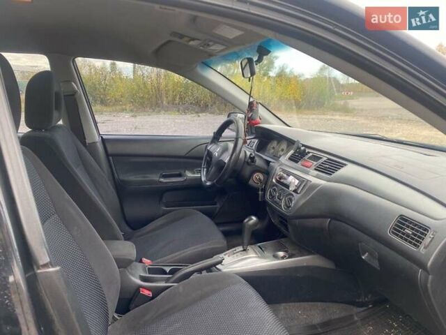 Чорний Міцубісі Lancer, об'ємом двигуна 1.6 л та пробігом 335 тис. км за 3500 $, фото 6 на Automoto.ua