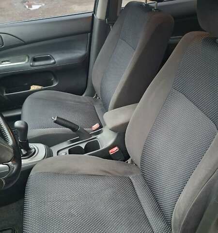 Черный Мицубиси Лансер, объемом двигателя 1.58 л и пробегом 246 тыс. км за 4200 $, фото 12 на Automoto.ua