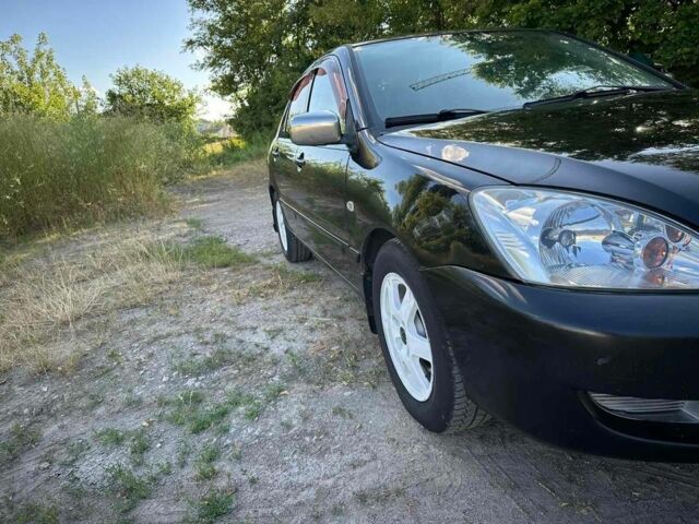 Черный Мицубиси Лансер, объемом двигателя 1.6 л и пробегом 289 тыс. км за 3200 $, фото 6 на Automoto.ua