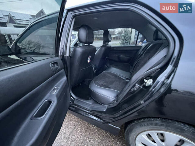 Чорний Міцубісі Lancer, об'ємом двигуна 1.58 л та пробігом 196 тис. км за 3800 $, фото 23 на Automoto.ua