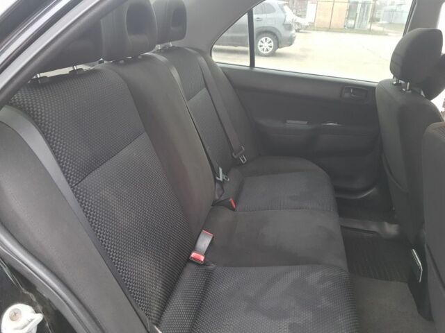 Черный Мицубиси Лансер, объемом двигателя 1.6 л и пробегом 290 тыс. км за 3200 $, фото 7 на Automoto.ua