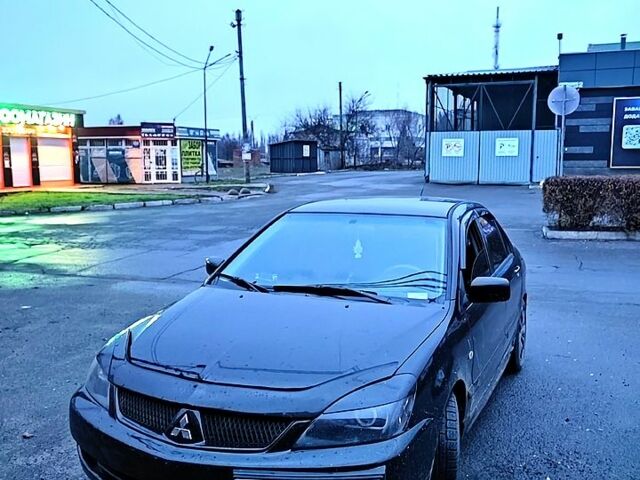 Чорний Міцубісі Lancer, об'ємом двигуна 1.6 л та пробігом 240 тис. км за 4000 $, фото 2 на Automoto.ua