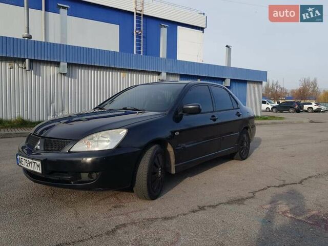 Чорний Міцубісі Lancer, об'ємом двигуна 1.58 л та пробігом 290 тис. км за 3200 $, фото 3 на Automoto.ua
