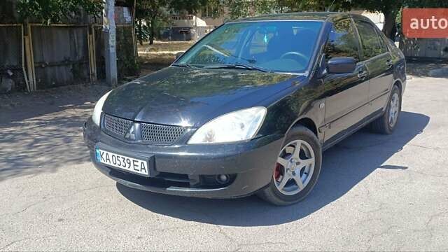 Чорний Міцубісі Lancer, об'ємом двигуна 1.6 л та пробігом 240 тис. км за 3900 $, фото 1 на Automoto.ua