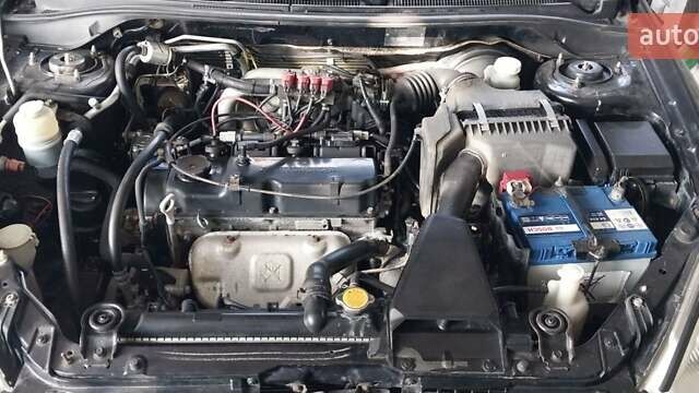 Чорний Міцубісі Lancer, об'ємом двигуна 1.59 л та пробігом 185 тис. км за 4900 $, фото 12 на Automoto.ua