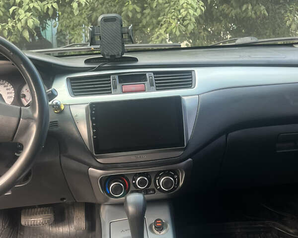 Чорний Міцубісі Lancer, об'ємом двигуна 1.6 л та пробігом 200 тис. км за 4300 $, фото 4 на Automoto.ua