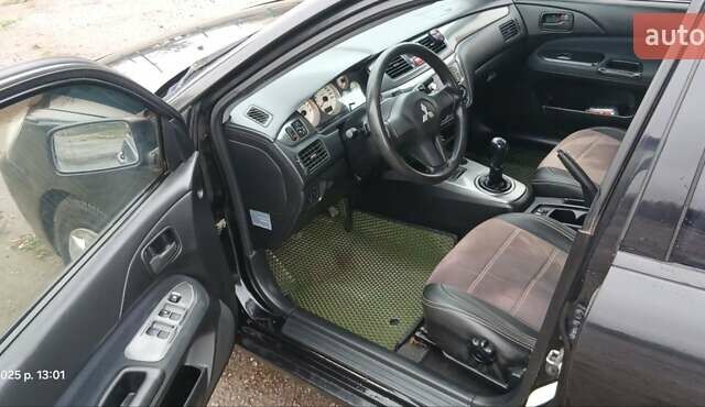 Чорний Міцубісі Lancer, об'ємом двигуна 1.6 л та пробігом 230 тис. км за 3250 $, фото 3 на Automoto.ua