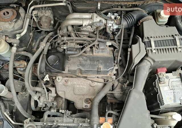 Черный Мицубиси Лансер, объемом двигателя 1.58 л и пробегом 246 тыс. км за 4200 $, фото 14 на Automoto.ua