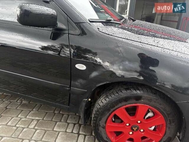 Чорний Міцубісі Lancer, об'ємом двигуна 1.6 л та пробігом 350 тис. км за 3300 $, фото 5 на Automoto.ua