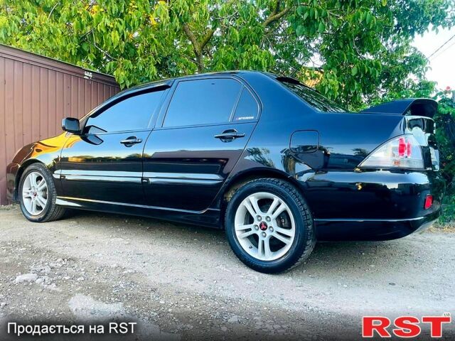 Чорний Міцубісі Lancer, об'ємом двигуна 2 л та пробігом 347 тис. км за 5200 $, фото 6 на Automoto.ua