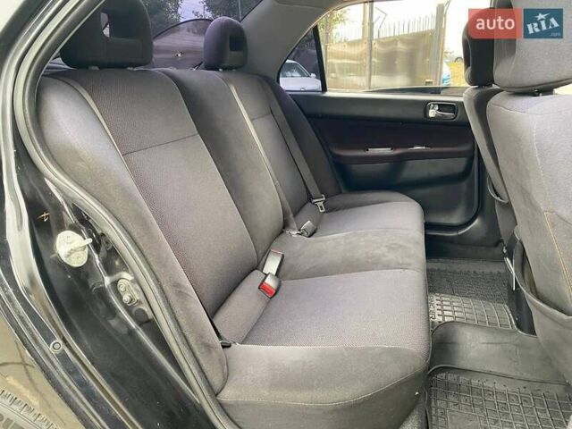 Чорний Міцубісі Lancer, об'ємом двигуна 2 л та пробігом 248 тис. км за 4990 $, фото 10 на Automoto.ua