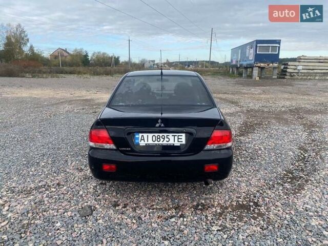 Чорний Міцубісі Lancer, об'ємом двигуна 1.6 л та пробігом 335 тис. км за 3500 $, фото 3 на Automoto.ua