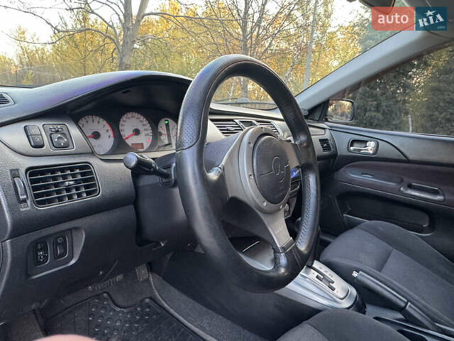 Міцубісі Lancer 2006 у Дніпро (Дніпропетровську) на Automoto.ua Чорний Міцубісі Lancer, об'ємом двигуна 2 л та пробігом 230 тис. км за 4900 $, фото 16 на Automoto.ua