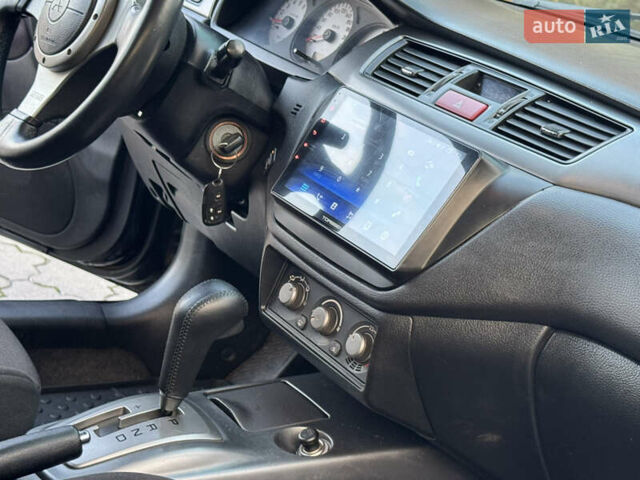 Міцубісі Lancer 2006 у Дніпро (Дніпропетровську) на Automoto.ua Чорний Міцубісі Lancer, об'ємом двигуна 2 л та пробігом 230 тис. км за 4900 $, фото 19 на Automoto.ua