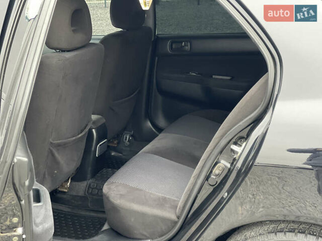 Чорний Міцубісі Lancer, об'ємом двигуна 1.58 л та пробігом 230 тис. км за 3350 $, фото 20 на Automoto.ua