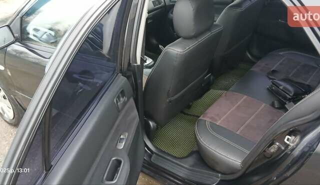 Чорний Міцубісі Lancer, об'ємом двигуна 1.6 л та пробігом 230 тис. км за 3250 $, фото 4 на Automoto.ua