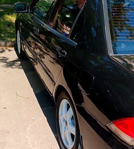 Чорний Міцубісі Lancer, об'ємом двигуна 1.6 л та пробігом 230 тис. км за 3500 $, фото 9 на Automoto.ua