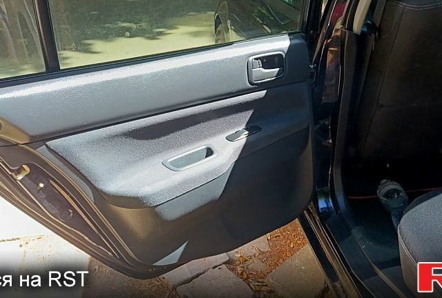 Черный Мицубиси Лансер, объемом двигателя 1.6 л и пробегом 238 тыс. км за 4300 $, фото 8 на Automoto.ua