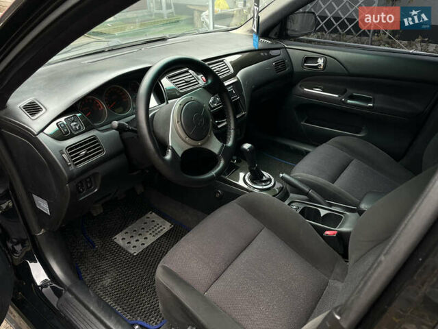 Чорний Міцубісі Lancer, об'ємом двигуна 2 л та пробігом 242 тис. км за 5900 $, фото 9 на Automoto.ua