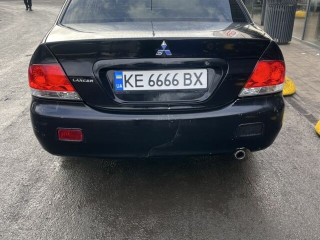 Черный Мицубиси Лансер, объемом двигателя 1.6 л и пробегом 299 тыс. км за 3480 $, фото 2 на Automoto.ua