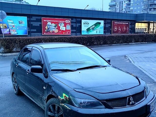 Чорний Міцубісі Lancer, об'ємом двигуна 1.6 л та пробігом 240 тис. км за 4000 $, фото 1 на Automoto.ua