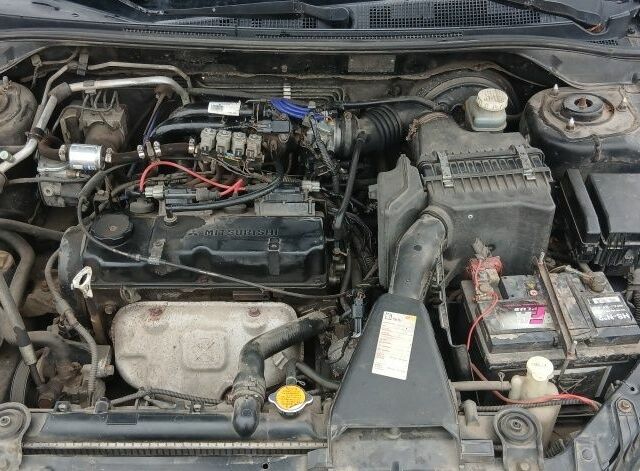 Черный Мицубиси Лансер, объемом двигателя 1.6 л и пробегом 230 тыс. км за 3250 $, фото 6 на Automoto.ua