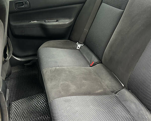 Черный Мицубиси Лансер, объемом двигателя 1.59 л и пробегом 251 тыс. км за 3950 $, фото 14 на Automoto.ua