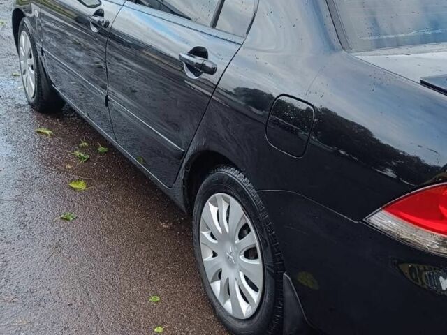Чорний Міцубісі Lancer, об'ємом двигуна 1.6 л та пробігом 250 тис. км за 4000 $, фото 6 на Automoto.ua