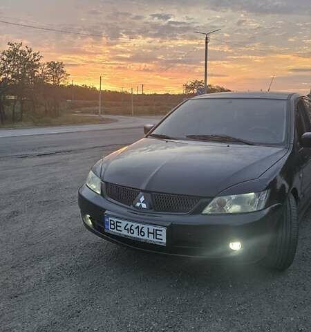 Чорний Міцубісі Lancer, об'ємом двигуна 1.6 л та пробігом 350 тис. км за 4950 $, фото 4 на Automoto.ua