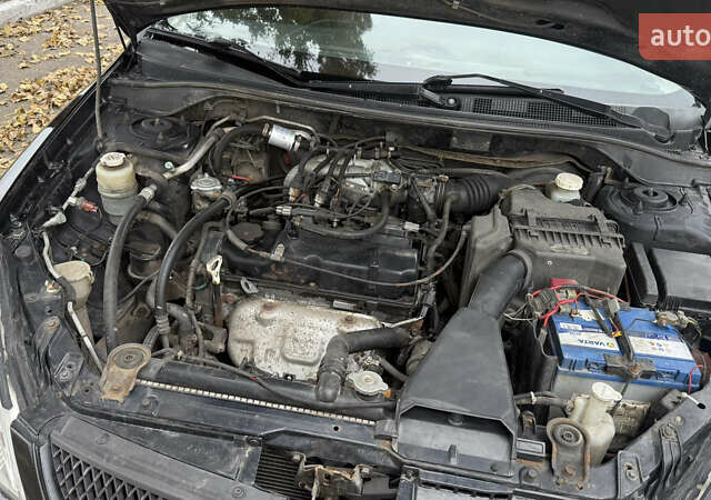 Чорний Міцубісі Lancer, об'ємом двигуна 1.58 л та пробігом 386 тис. км за 4450 $, фото 22 на Automoto.ua
