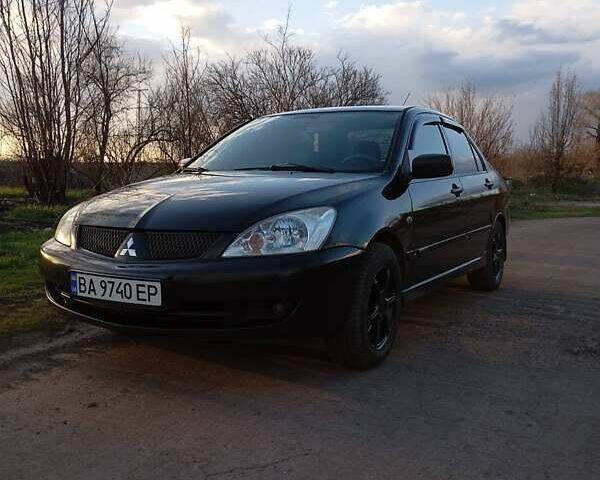 Чорний Міцубісі Lancer, об'ємом двигуна 1.6 л та пробігом 325 тис. км за 4750 $, фото 16 на Automoto.ua