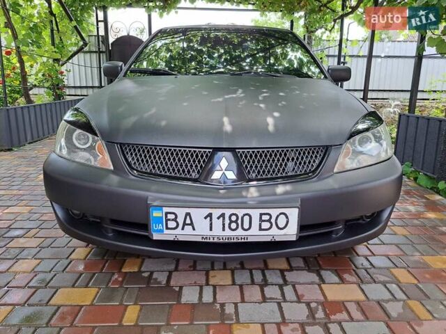Чорний Міцубісі Lancer, об'ємом двигуна 1.58 л та пробігом 280 тис. км за 3950 $, фото 2 на Automoto.ua