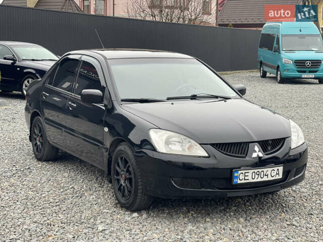 Чорний Міцубісі Lancer, об'ємом двигуна 1.58 л та пробігом 230 тис. км за 3350 $, фото 3 на Automoto.ua