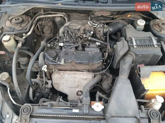 Чорний Міцубісі Lancer, об'ємом двигуна 1.58 л та пробігом 290 тис. км за 3200 $, фото 18 на Automoto.ua