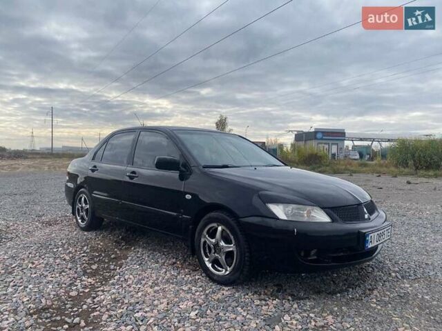 Чорний Міцубісі Lancer, об'ємом двигуна 1.6 л та пробігом 335 тис. км за 3500 $, фото 2 на Automoto.ua