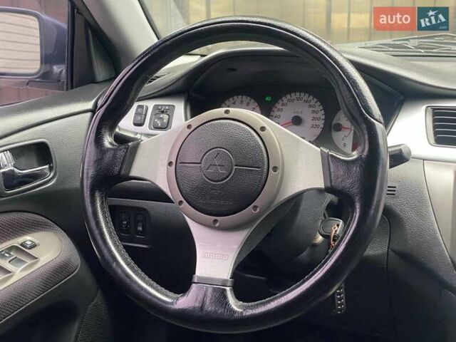 Чорний Міцубісі Lancer, об'ємом двигуна 2 л та пробігом 248 тис. км за 4990 $, фото 13 на Automoto.ua