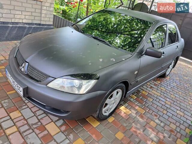 Чорний Міцубісі Lancer, об'ємом двигуна 1.58 л та пробігом 280 тис. км за 3950 $, фото 1 на Automoto.ua