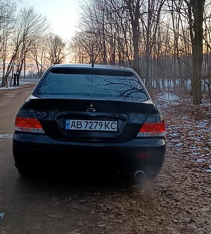 Чорний Міцубісі Lancer, об'ємом двигуна 1.6 л та пробігом 345 тис. км за 3700 $, фото 2 на Automoto.ua