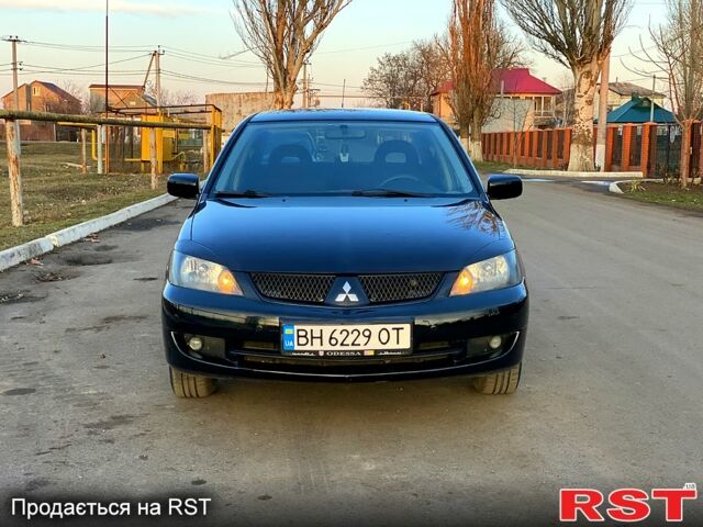 Чорний Міцубісі Lancer, об'ємом двигуна 1.6 л та пробігом 162 тис. км за 4999 $, фото 4 на Automoto.ua