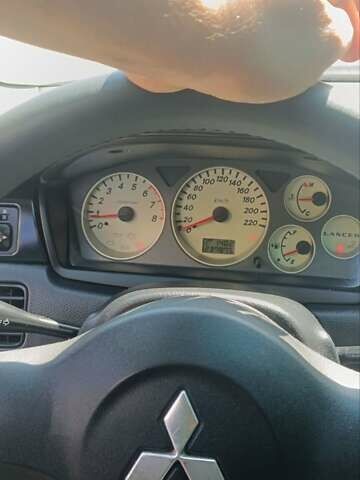 Чорний Міцубісі Lancer, об'ємом двигуна 1.6 л та пробігом 240 тис. км за 3900 $, фото 11 на Automoto.ua