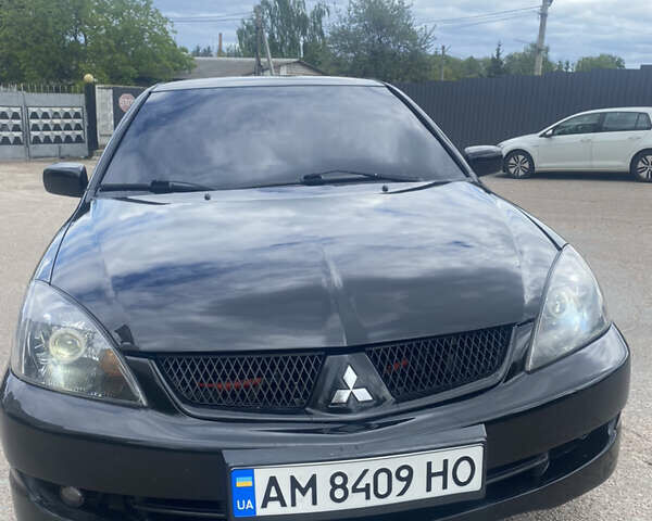 Чорний Міцубісі Lancer, об'ємом двигуна 2 л та пробігом 183 тис. км за 4500 $, фото 15 на Automoto.ua