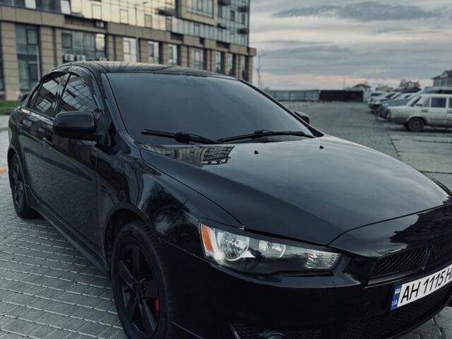 Черный Мицубиси Лансер, объемом двигателя 2 л и пробегом 242 тыс. км за 6200 $, фото 2 на Automoto.ua