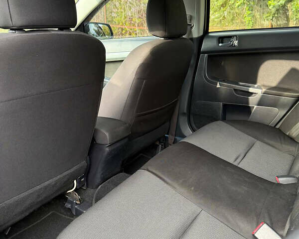 Черный Мицубиси Лансер, объемом двигателя 2 л и пробегом 219 тыс. км за 6400 $, фото 18 на Automoto.ua