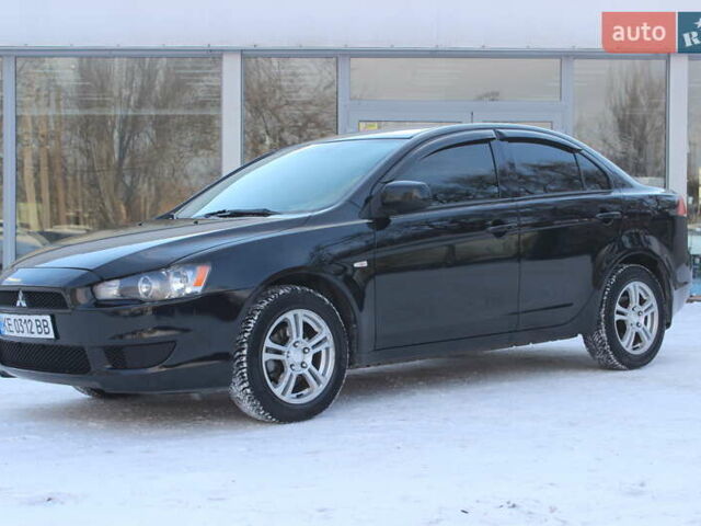 Черный Мицубиси Лансер, объемом двигателя 1.5 л и пробегом 206 тыс. км за 6999 $, фото 1 на Automoto.ua