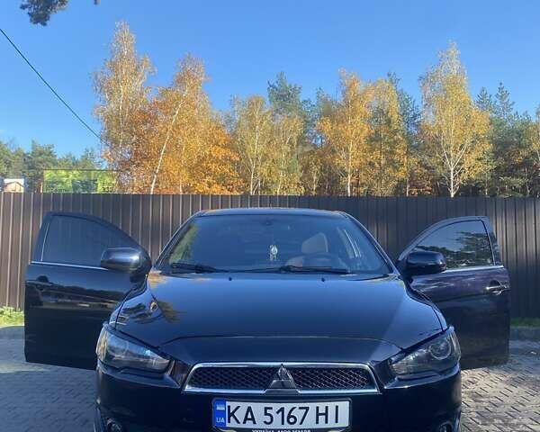 Мицубиси Лансер 2007 в Гостомель на Automoto.ua Черный Мицубиси Лансер, объемом двигателя 2 л и пробегом 258 тыс. км за 7200 $, фото 13 на Automoto.ua