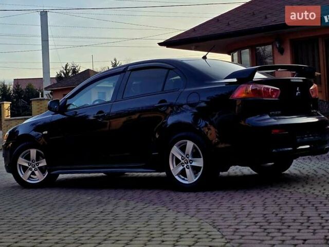Чорний Міцубісі Lancer, об'ємом двигуна 2 л та пробігом 260 тис. км за 6555 $, фото 4 на Automoto.ua