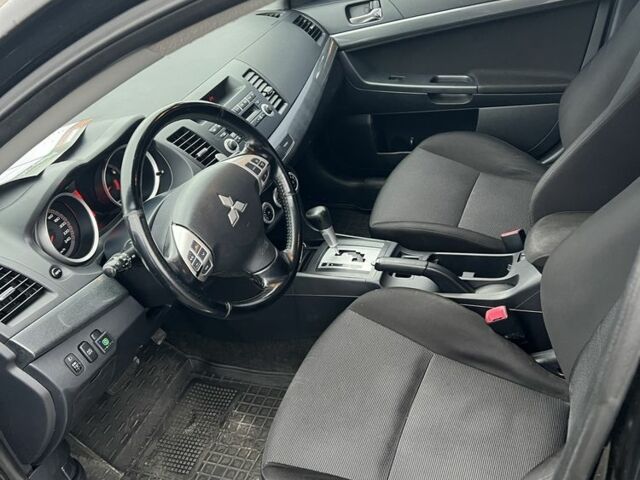 Черный Мицубиси Лансер, объемом двигателя 2 л и пробегом 170 тыс. км за 7900 $, фото 7 на Automoto.ua