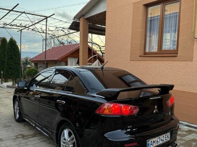 Черный Мицубиси Лансер, объемом двигателя 2 л и пробегом 247 тыс. км за 4700 $, фото 4 на Automoto.ua